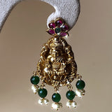 Gold-colored jewelry set with goddess Lakshmi, dark pink and green stones