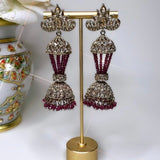Bronze colored jhumka earrings with dark red beads