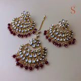 Gold-colored earrings &amp; head jewelry with kundan stones