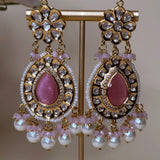 Gold-colored large earrings with beautiful pink stones and pearls