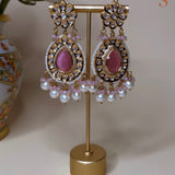 Gold-colored large earrings with beautiful pink stones and pearls