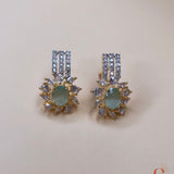 Gold-colored jewelry set with light blue beads